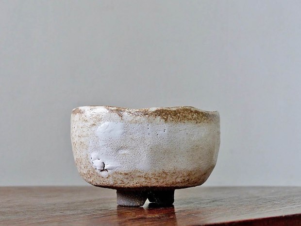 Black clay Tea Bowl with burnt white glaze by Annette Lindenberg